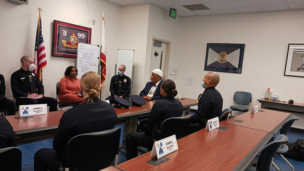 LAPD Chaplain Rushdan Mujahid-Deen meets with department team